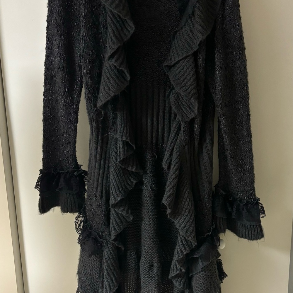Worn once charcoal gray sweater with ruffled lace